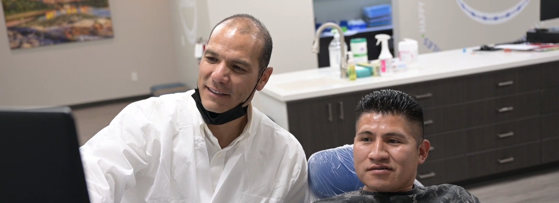 Dr. Edgar Mendieta talking to a patient.